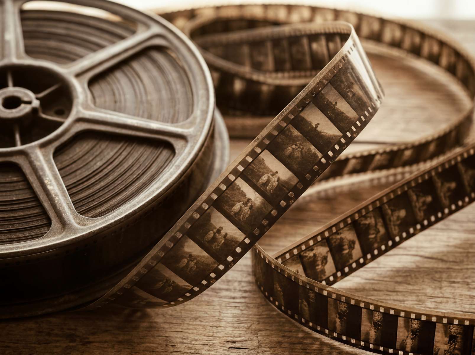 reel of vintage film for a background in sepia colours